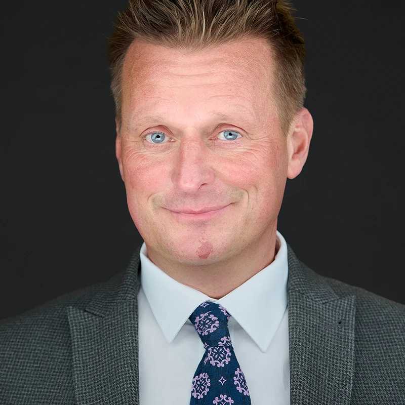 Professional headshot photographer working in Falmouth, showing expert portrait lighting for Cornwall's maritime and academic professionals