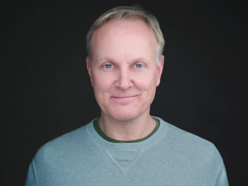 Toast team member professional headshot with natural expression, modern style