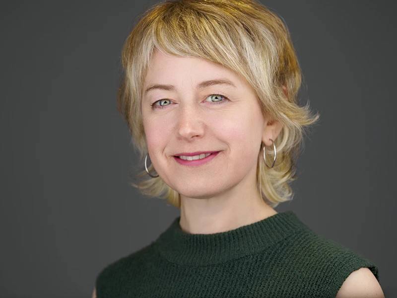 Bristol musician smiling naturally - showcasing a portrait lighting style.