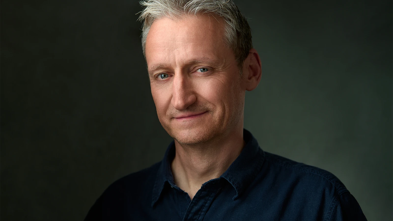 Horror author David Watkins during professional headshot session showing confident author presence