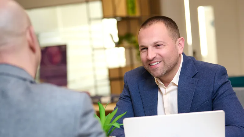 Confident personal branding portrait with strong eye contact and a self-assured presence