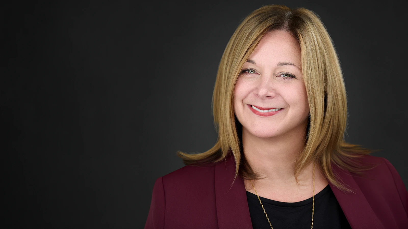 Professional headshot photographer in Swindon, studio-quality business portrait at a Wiltshire workplace